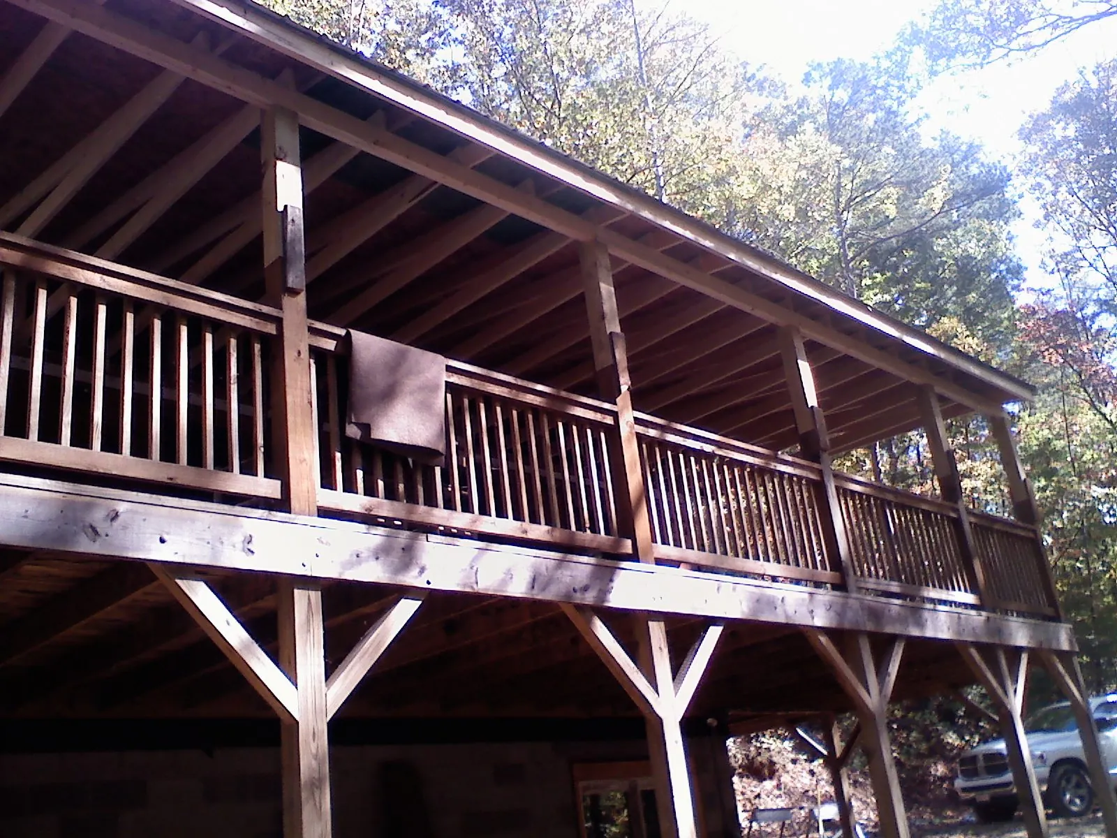 Timber framing under a new elevated porch and deck — Roof Leak Repair in Westmont by Roofing Brothers